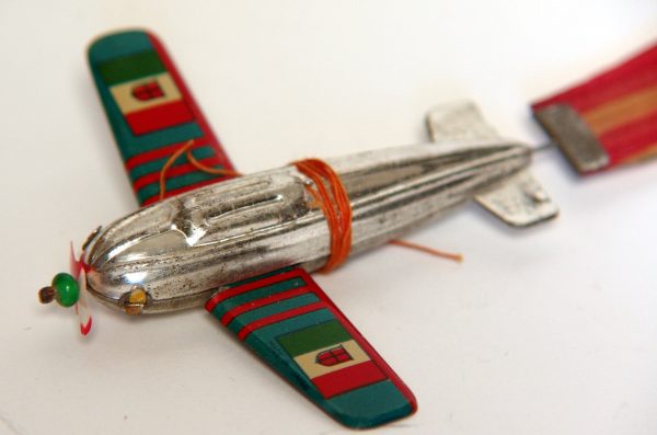 Occupied Japan Tin Flagged Airplanes and Bamboo Flying Stick on Sale